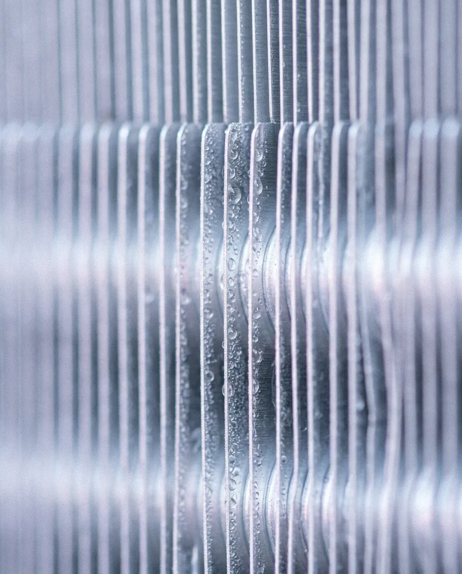 Macro of condenser fins beaded with condensation